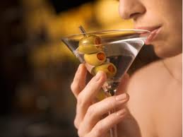 woman drinking martini