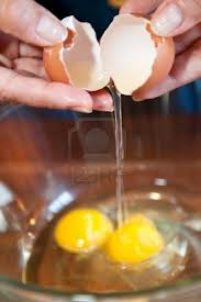 egg-being-broken-up-to-show-clear-liquid
