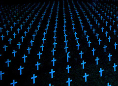 graveyard-filled-with-crosses-in-blue-cancer-heart-disease