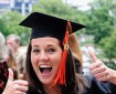renovating-your-mind-looks-at-college-graduation-college-costs-jobs-female-graduate-gives-thumbs-up