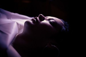 death-is-the-end-all-woman-laying-on-her deathbed