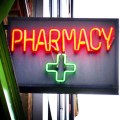 neon-pharmacy-sign-with-green-cross