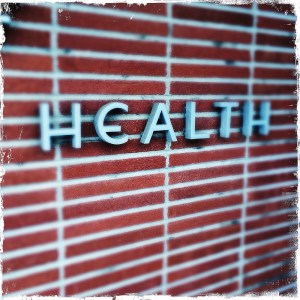 health-sign-on-wall-brick-background