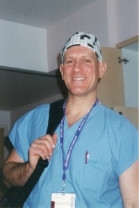 smiling-casual-comfortable-physician-in-blues-fatigues